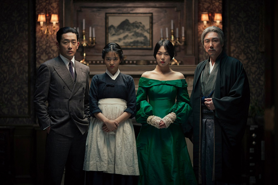 Kim, then an anonymous actor, was cast in director Park Chan-wook's highly-anticipated film "The Handmaiden" (2016) in December 2014. She starred alongside Ha Jung-woo, Kim Min-hee and Cho Jin-woong. [CJ ENTERTAINMENT] 