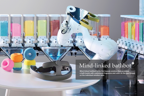 The Mind-linked Bathbot, a robot introduced by Amorepacific at CES 2022. The robot creates a bath bomb with a fragrance and color that best matches emotions.[AMOREPACIFIC]