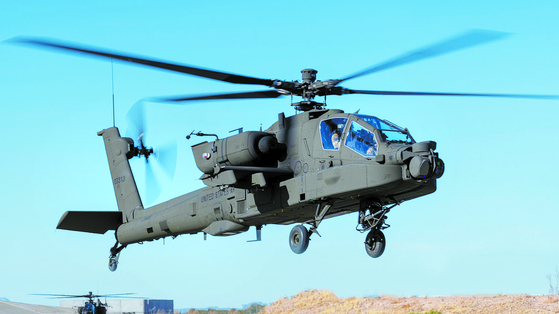 A photo of the AH-64 Version 6 helicopter, the latest version of the Apache aircraft, taking flight at the Boeing manufacturing site in Mesa, Arizona, on Jan. 13, 2021. [BOEING]