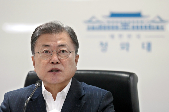 President Moon Jae-in asks about the safety of Koreans in Ukraine during a National Security Council meeting at the Blue House on Tuesday. [BLUE HOUSE] 