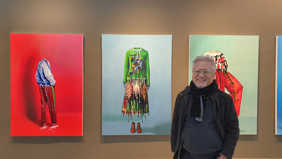 Artist Ahn Chang Hong stands in front of his artworks from ″Ghost Fashion.″ [SAVINA MUSEUM OF CONTEMPORARY ART]