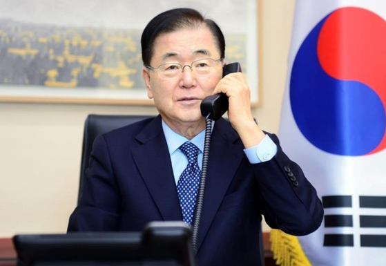 Foreign Minister Chung Eui-yong takes a phone call in a file photo provided by the Foreign Ministry. [YONHAP]