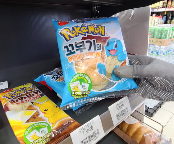 Pokemon bread, given the name because there is a Pokemon sticker inside each package, is displayed at a convenience store in Seoul. [NEWS1]