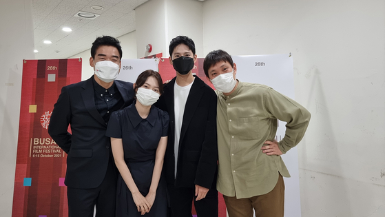 From left, actors Jin Dae-yeon, Park Yu-rim, Ahn Hwi-tae and director Ryusuke Hamaguchi pose for a photo at the 2021 Busan International Film Festival in October. [BIFF]