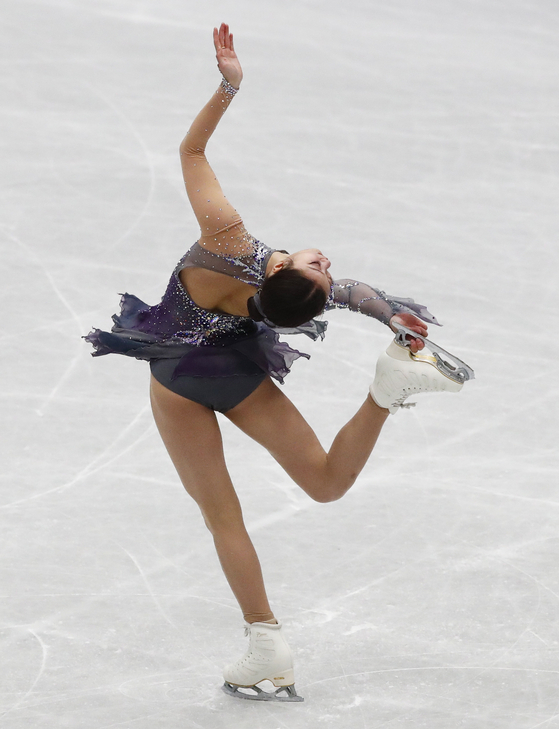 You Young performs a Biellmann spin during the women's short program at the ISU 2022 Figure Skating World Championships in Montpellier, France on Wednesday. [EPA/YONHAP]