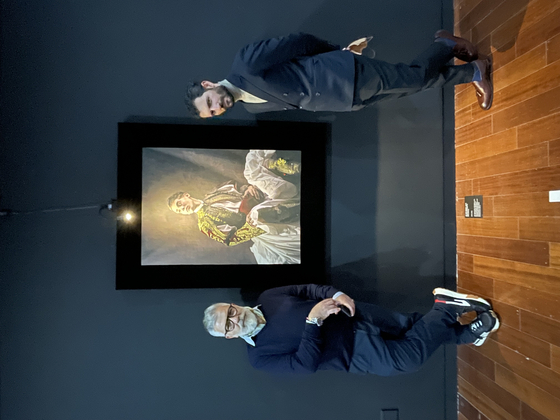 Vangelis Kyris, left, and Anatoli Georgiev, right, at the KF Gallery in central Seoul on March 24. [ESTHER CHUNG]