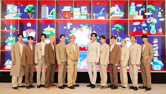 Boy band Seventeen attends Thursday's press conference for its collaboration project celebrating the impending opening of Apple Myeongdong, the largest Apple retail store in Korea, in central Seoul. [APPLE]