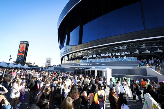 Tens-of-thousands of ARMY, the name of BTS’s fans, wait to enter Allegiant Stadium in Las Vegas on April 9, ahead of the boy band’s second of four performances in the city. [HYBE]