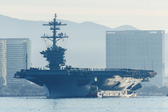 The USS Abraham Lincoln deploys from the San Diego Naval Air Station North Island in San Diego, California on January 3, 2022. [REUTERS/YONHAP]