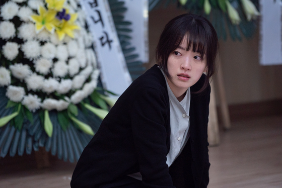 A scene from “I Want to Know Your Parents,” where Chun is a high school teacher who struggles to get the word out on school bullying when she receives a suicide letter from one of her students. [MINDMARK]