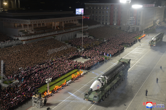 Hwasong-17, an intercontinental ballistic missile, is on display at a military parade in Pyongyang's Kim Il Sung Square Monday evening. [YONHAP] 