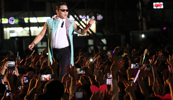 In October 2012, PSY performs his worldwide hit ″Gangnam Style″ (2012) during a concert in Seoul Plaza in front of Seoul City Hall, central Seoul. [JOONGANG ILBO]