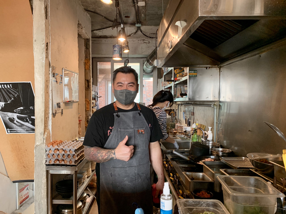 Sriprateep Paw, 44, the owner-chef of Pad Ka Paw in Shin Heung Art Market [LEE JIAN]