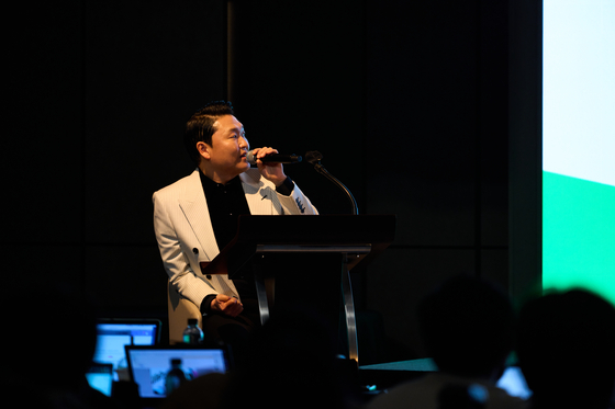 PSY discusses his new tracks at the press conference. [P NATION]          