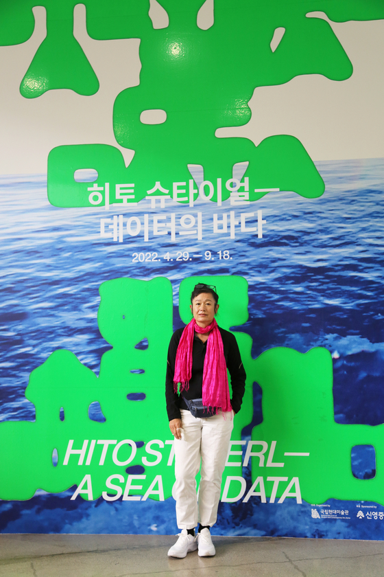 Steyerl poses during a press conference at the MMCA on Thursday. [MMCA]