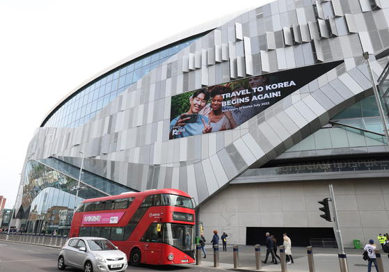 A banner promoting travel to Korea hangs outside Tottenham Hotspur Stadium during the Premier League match between Tottenham Hotspur and Leicester City on Sunday in London. [TOTTENHAM HOTSPUR] 