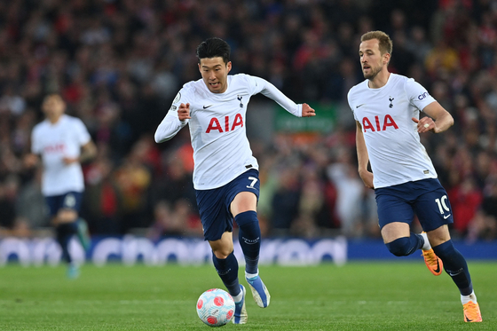 Tottenham Hotspur's Son Heung-min runs with the ball during the Premier League football match between Liverpool and Tottenham Hotspur at Anfield in Liverpool, north west England, on Saturday. [AFP/YONHAP]