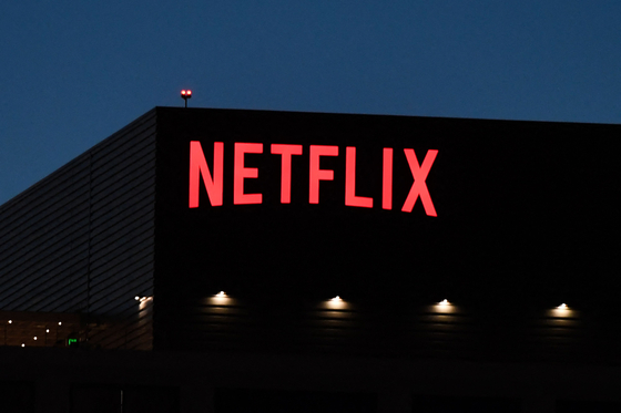In this file photo taken on Oct. 19, 2021, the Netflix logo is seen on the Netflix, Inc. building on Sunset Boulevard in Los Angeles, California. [AFP/YONHAP]