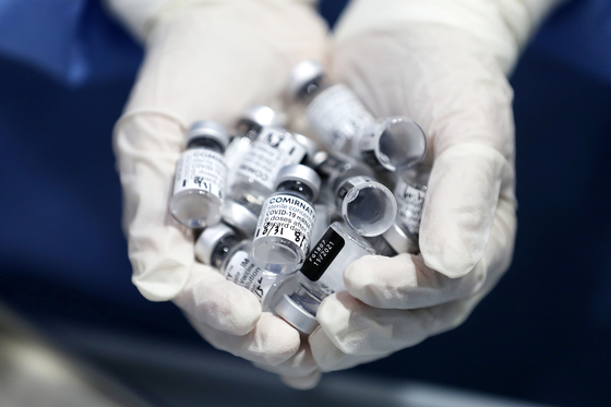 Used vials of the Pfizer vaccine [NEWS1]