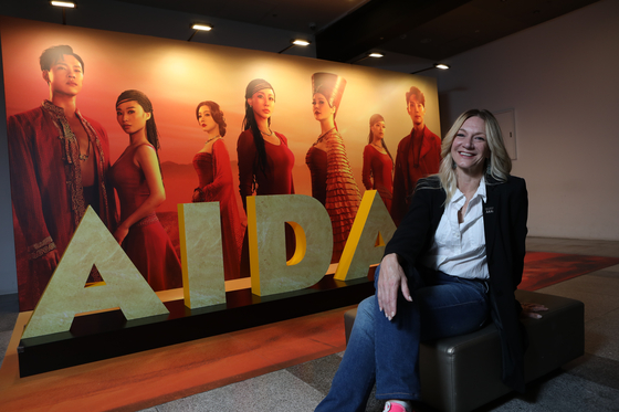 Tracey Corea, associate director and choreographer of the ongoing sixth season of the Korean production of "Aida," poses in front of the musical's photo zone at Blue Square in Yongsan District, central Seoul. [PARK SANG-MOON]