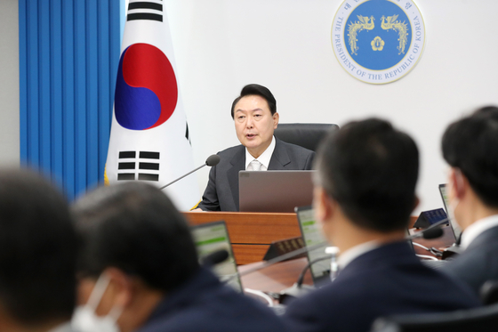 President Yoon Suk-yeol holds his first cabinet meeting on Thursday at his office in Yongsan, Seoul, where one of the key issues addressed was the record-breaking supplementary budget. [JOINT PRESS CORPS] 