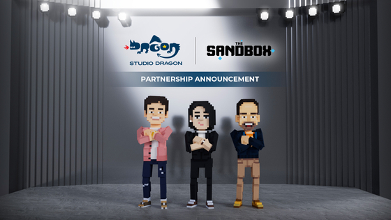 Avatars of executives from Studio Dragon and The SandBox take part in a signing ceremony in The Sandbox metaverse. [STUDIO DRAGON]