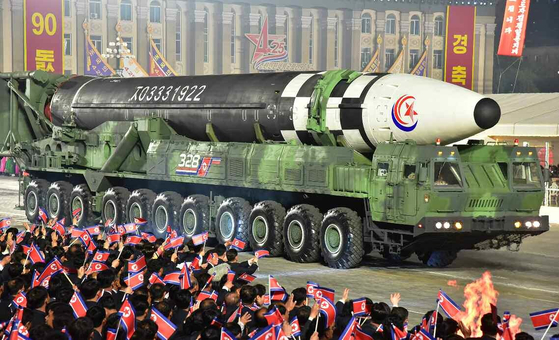 In this photo released by the state-run Rodong Sinmun, North Korea's most advanced intercontinental ballistic missile to date, the Hwasong-17, is paraded through downtown Pyongyang on April 25 during a parade celebrating the 90th anniversary of the founding of the regime's armed forces. [NEWS1]