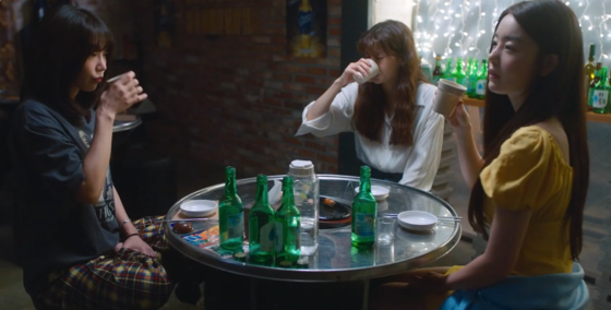 So-hee, Ji-yeon and Ji-gu drink soju in a scene from "Work Later, Drink Now" (2021) [SCREEN CAPTURE]