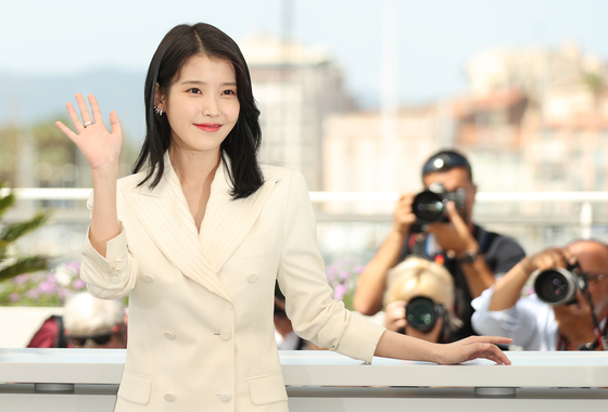 Actor Lee Ji-eun poses during a photocall for the film "Broker" presented in the Official Competition at the 75th edition of the Cannes Film Festival in Cannes, southern France, on May 27. [XINHUA/GAO JING] 