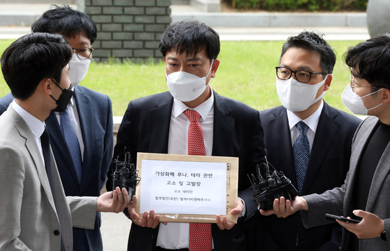 LKB & Partners attorneys speak to reporters at the Seoul Southern District Prosecutors' Office after filing a complaint against Terraform Labs and co-founders Do Kwon and Daniel Shin on May 19. [NEWS1] 