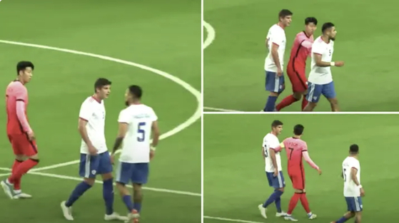 Son Heung-min, in red, breaks up a fight between Chile's Paulo Diaz and Benjamin Kuscevic during a game between Korea and Chile at Daejeon World Cup Stadium in Daejeon on Monday. [SCREEN CAPTURE]