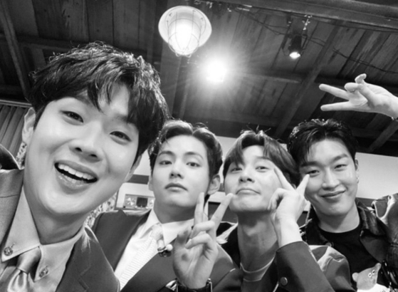 The Wooga Fam members from left, Choi Woo-shik, V, Park Seo-jun and Peakboy during Choi's 10th-anniversary online fan meet [SCREEN CAPTURE OF KAKAO TV]
