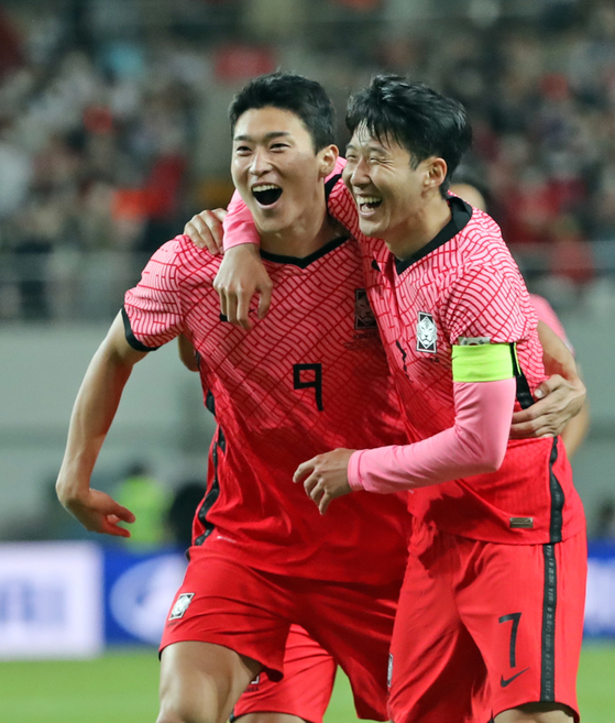 Cho Gue-sung, left, celebrates with Son Heung-min after scoring Korea's third goal in a game against Egypt at Seoul World Cup Stadium in Mapo District, western Seoul. [NEWS1]