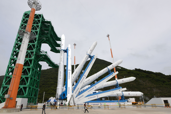 In this overlay photo, Korea Space Launch Vehicle-II, otherwise known as Nuri, is being erected in a vertical position ahead of the launch scheduled for Tuesday, at the Naro Space Center in Goheung County, South Jeolla, on Monday. [KARI]