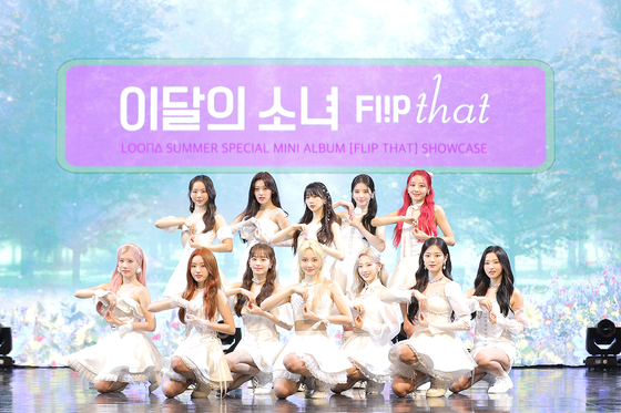 Girl group Loona poses during a showcase for its new EP ″Flip That″ on Monday at Coex in southern Seoul. [BLOCKBERRY CREATIVE]
