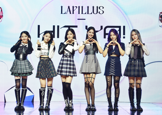 Girl group Lapillus poses during its debut showcase at Shinhan Play Square in western Seoul’s Hapjeong on June 20. [MLD ENTERTAINMENT]