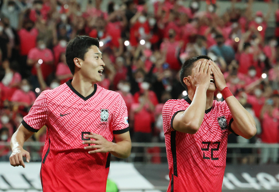 Cho Gue-sung, left, and Kwon Chang-hoon celebrate after Kwon scored for the Korean national team in a game against Egypt at Seoul World Cup Stadium in western Seoul on June 14. Both Cho and Kwon play for K League 1 side Gimcheon Sangmu.  [YONHAP]