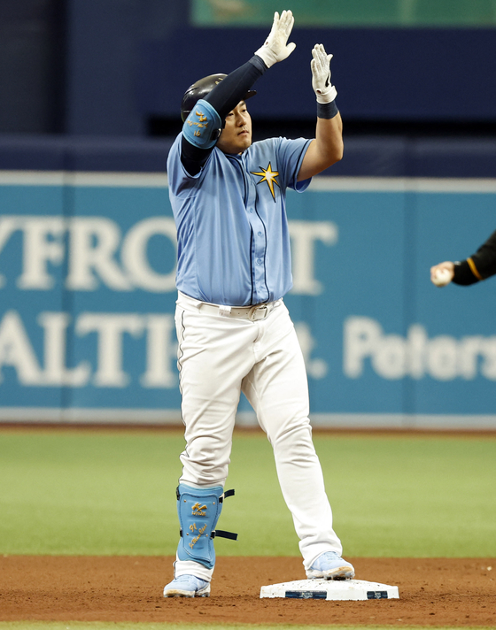 Choi Ji-man of the Tampa Bay Rays celebrates at second base after hitting an RBI double to put the Rays ahead of the Pittsburgh Pirates in the seventh inning of a game at Tropicana Field in St. Petersburg, Florida on Sunday. Choi is currently pacing the team with 35 runs batted in so far this season. [USA TODAY/YONHAP]