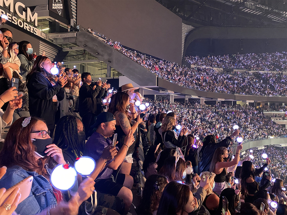 Fans of BTS, dubbed ARMY, cheer during a BTS concert held in April in Las Vegas. [YONHAP]