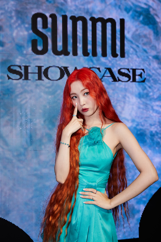 Sunmi poses during a showcase event for her new EP ″Heart Burn″ a few hours before its release on Wednesday. [ABYSS COMPANY]