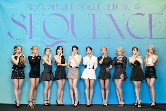 WJSN poses at a press conference on July 5 for its new EP "Sequence" at the Stanford Hotel Seoul in Mapo District, western Seoul. [STARSHIP ENTERTAINMENT]   