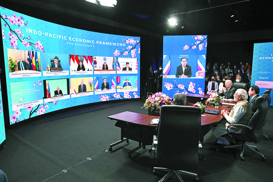 U.S. President Joe Biden, Japan's Prime Minister Fumio Kishida, and India's Prime Minister Narendra Modi attend the Indo-Pacific Economic Framework for Prosperity with other regional leaders via video link at the Izumi Garden Gallery in Tokyo on May 23. [AFP/YONHAP] 