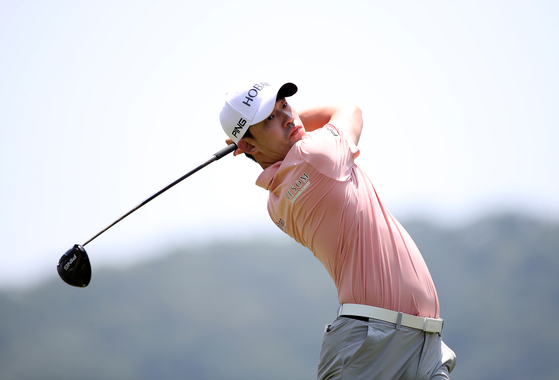 Kim Bio tees off at the third hole during the first round of the 65th KPGA Championship with A-One Country Club in Yangsan, South Gyeongsang on June 9. [YONHAP]