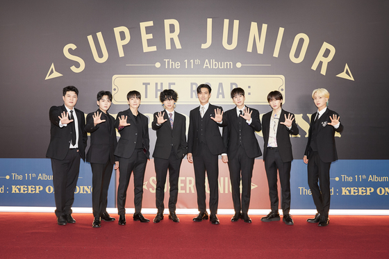 Super Junior poses during an online press conference for Volume 1 of its latest album ″The Road: Keep on Going.″ [LABEL SJ]