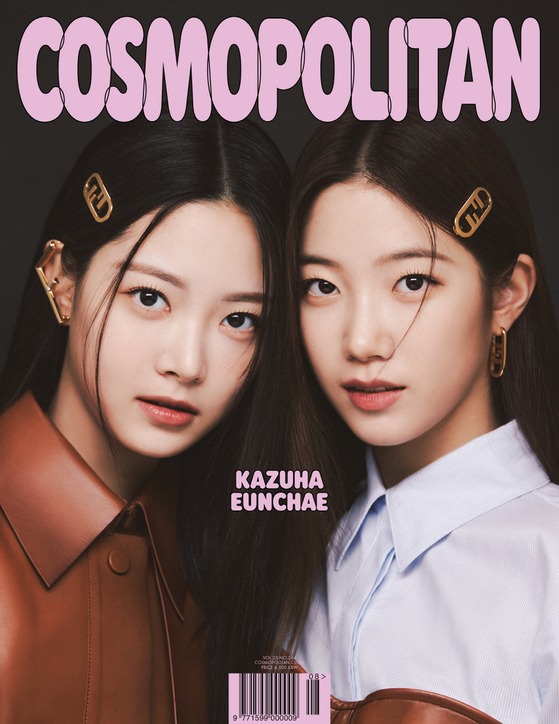 Hong Eunchae, left, and Kazuha on the cover of the August issue of Cosmopolitan Korea [FENDI]