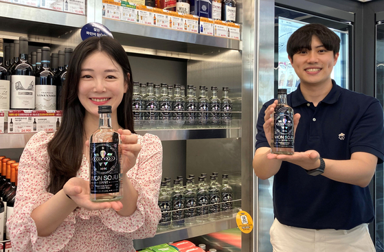 Models display Won Soju Spirit, a type of distilled soju sold by Jay Park’s Won Spirits. [GS RETAIL]