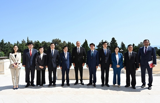 Then-Speaker of the National Assembly Park Byeong-seug, fifth from left, and Azerbaijan President Ilham Aliyev, sixth from left, pose together during Park's visit to Baku in August 2021. [KOREAN EMBASSY IN AZERBAIJAN] 