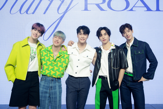 Boy band Astro pose for a photograph during an online press conference for its EP ″Drive to the Starry Road″ on May 16. [YONHAP]