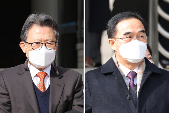 Baek Jong-chun, left, and Cho Myoung-gyon, exit from the Seoul High Court building in Seocho District, southern Seoul, on Feb. 9 2022. [YONHAP]