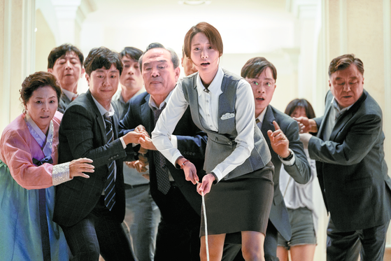 Lim Yoon-a, middle, in a scene in the action film "Exit" (2019) [LOTTE ENTERTAINMENT]